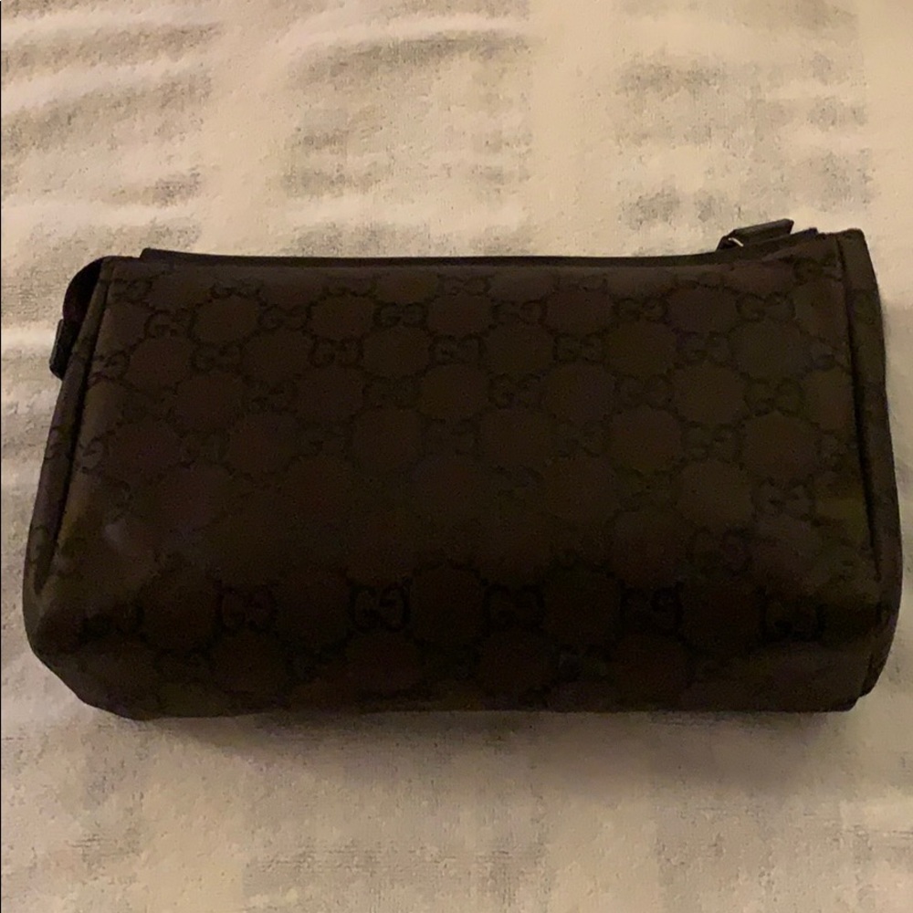 Gucci toiletries bag.